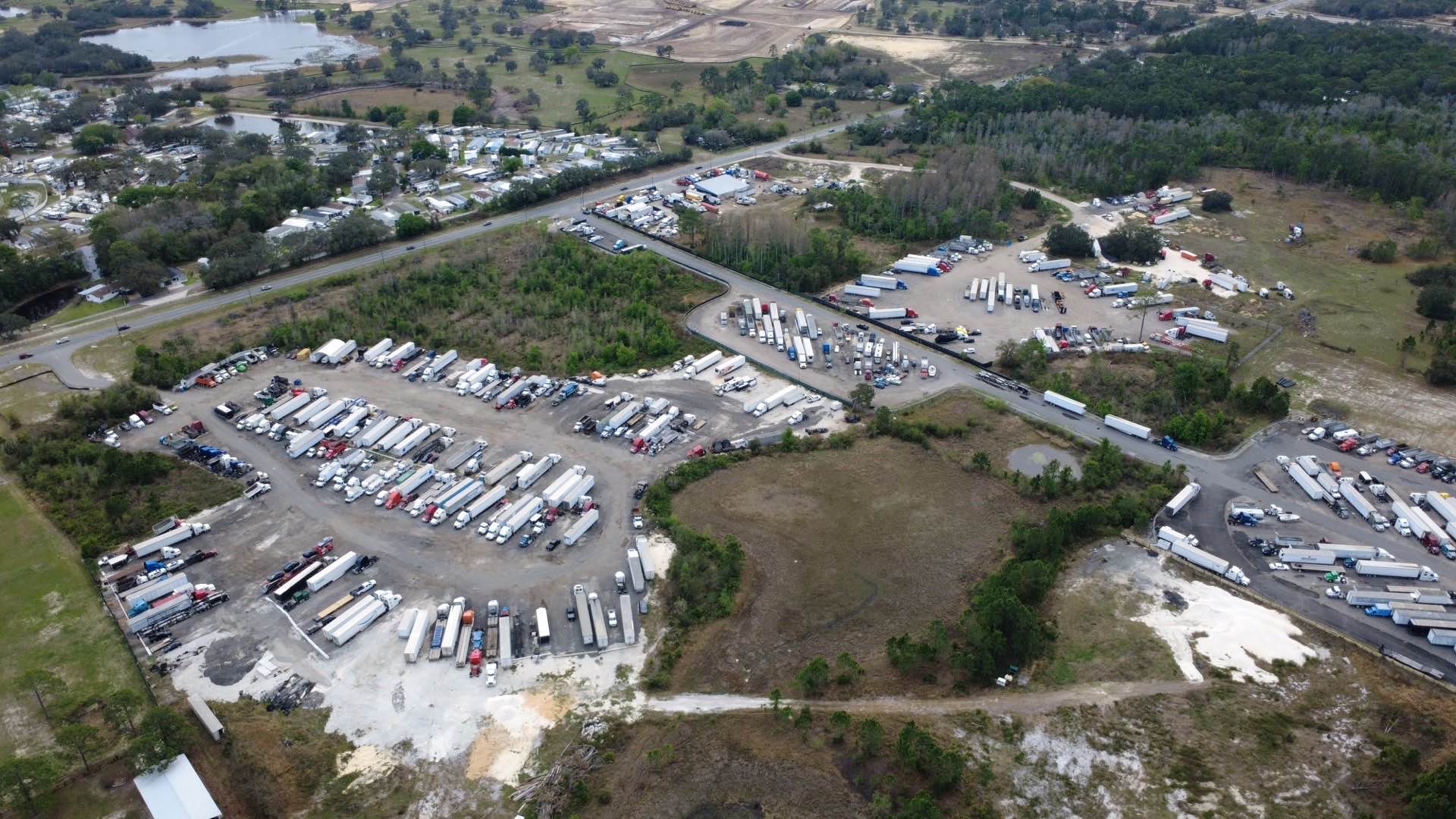 Secure truck parking area at Brensus Truck Parking in Davenport, FL